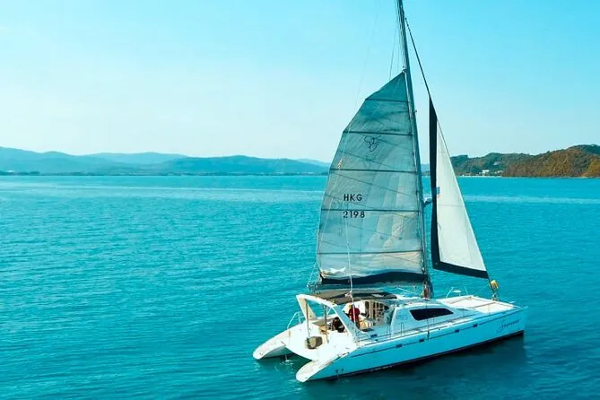 Racha and Coral Islands with Sunset at Promthep Cape by Catamaran Yacht by Bangtao Beach Bar